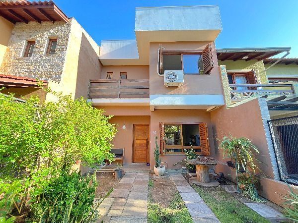 Casa à venda com 3 quartos, 137m², 1 suíte, 2 vagas, Rua Irany de Oliveira Santanna no bairro Hípica em Porto Alegre