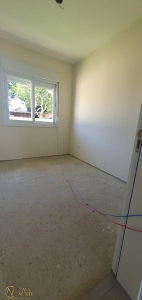 Casa de Condomínio à venda com 3 quartos, 70m², 2 vagas, Rua Criciuma no bairro Guarujá em Porto Alegre