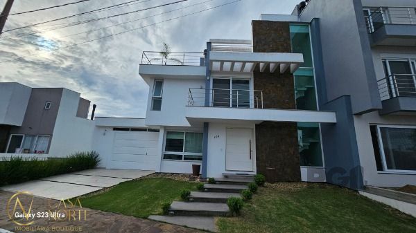 Casa à venda com 3 quartos, 248m², 1 suíte, 2 vagas, Rua Eroni Soares Machado no bairro Hípica em Porto Alegre
