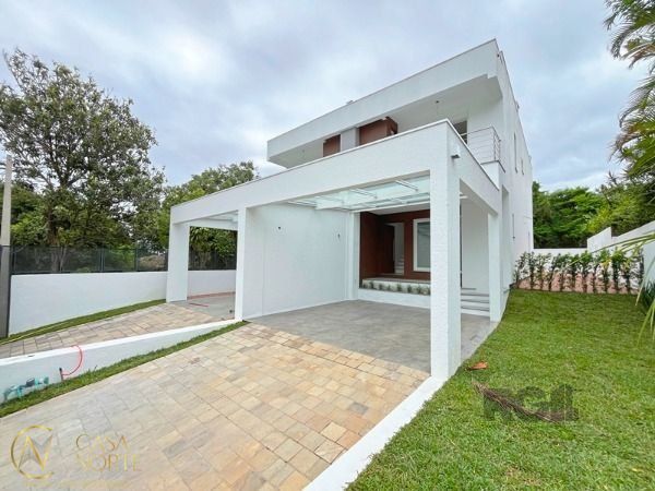 Casa à venda com 3 quartos, 155m², 1 suíte, 2 vagas, Rua Padre João Batista Reus no bairro Vila Conceição em Porto Alegre