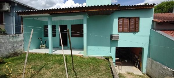 Casa à venda com 2 quartos, 60m², 2 vagas, Rua Tome Antônio de Souza no bairro Campo Novo em Porto Alegre