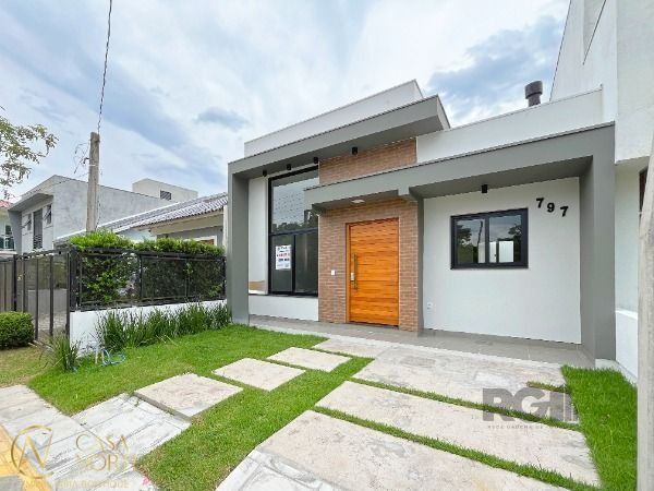 Casa à venda com 3 quartos, 93m², 1 suíte, 1 vaga, Rua Fernando Jorge Schneider no bairro Hípica em Porto Alegre
