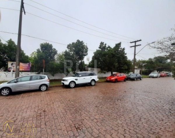 Terreno à venda  com 410m², Avenida Eduardo Prado no bairro Cavalhada em Porto Alegre
