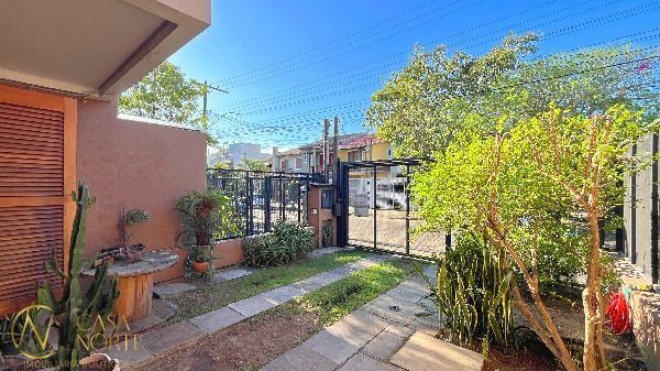 Casa à venda com 3 quartos, 137m², 1 suíte, 2 vagas, Rua Irany de Oliveira Santanna no bairro Hípica em Porto Alegre