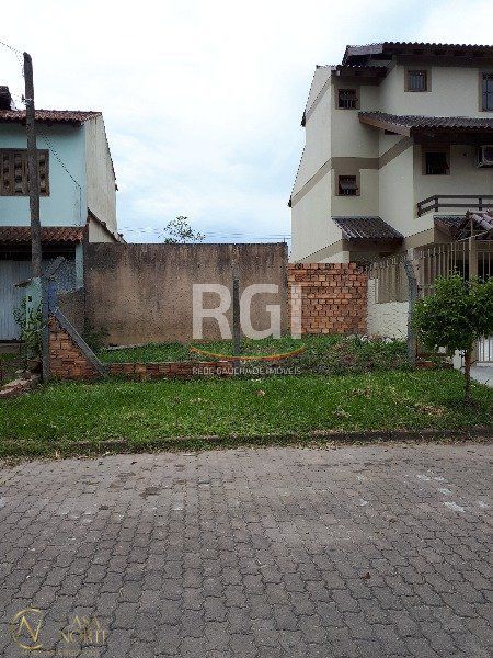 Terreno à venda  com 129m², Rua Paulo Stuart Wright no bairro Hípica em Porto Alegre