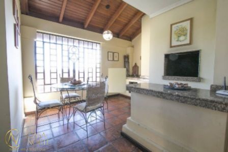 Casa à venda com 4 quartos, 450m², 3 suítes, 4 vagas, Rua Edgar Luiz Schneider no bairro Ipanema em Porto Alegre