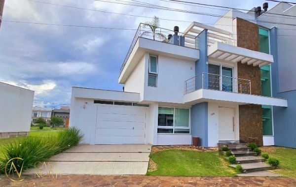 Casa à venda com 3 quartos, 248m², 1 suíte, 2 vagas, Rua Eroni Soares Machado no bairro Hípica em Porto Alegre