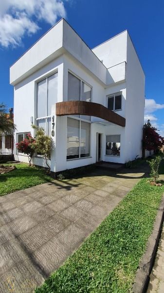 Casa à venda com 3 quartos, 223m², 1 suíte, 2 vagas, Rua Alexandre de Gusmao no bairro Hípica em Porto Alegre