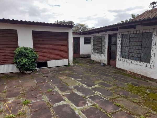 Casa à venda com 2 quartos, 420m², 1 suíte, 4 vagas, Rua Gregorio da Fonseca no bairro Nonoai em Porto Alegre
