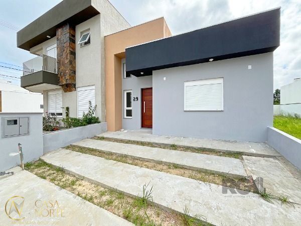 Casa de Condomínio à venda com 3 quartos, 102m², 1 suíte, 2 vagas, Rua Jean Vardaramatos no bairro Hípica em Porto Alegre