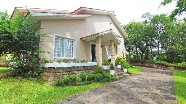 Casa de Condomínio à venda com 3 quartos, 348m², 3 suítes, 3 vagas, Avenida Professor Oscar Pereira no bairro Cascata em Porto Alegre