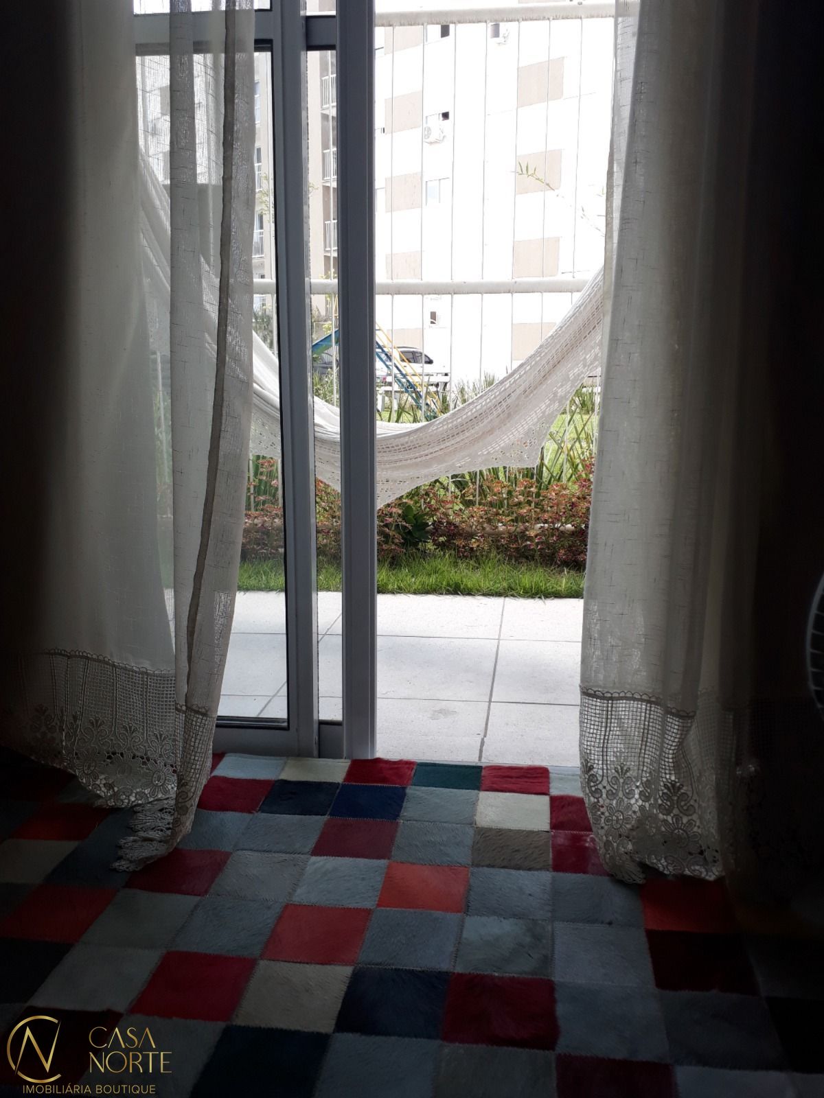 Apartamento à venda com 2 quartos, 55m², 1 vaga, Rua Joaquim de Carvalho no bairro Vila Nova em Porto Alegre