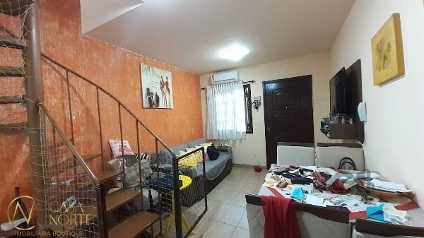 Casa de Condomínio à venda com 3 quartos, 60m², 1 vaga, Avenida Monte Cristo no bairro Vila Nova em Porto Alegre