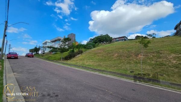 Terreno à venda  com 611m², Estrada das Três Meninas no bairro Vila Nova em Porto Alegre