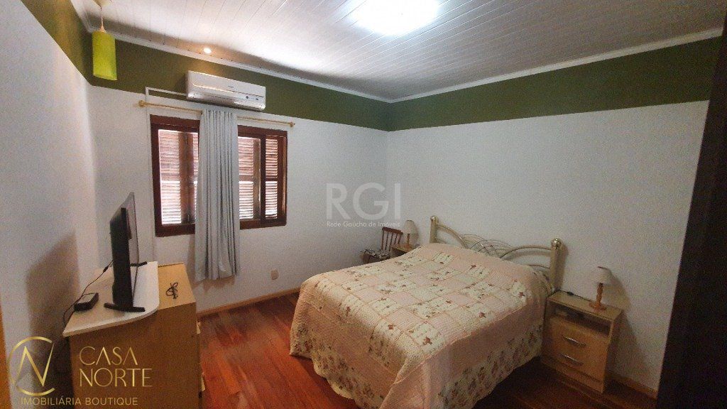 Casa à venda com 4 quartos, 290m², 2 suítes, 2 vagas, Avenida Herval no bairro Cascata em Porto Alegre
