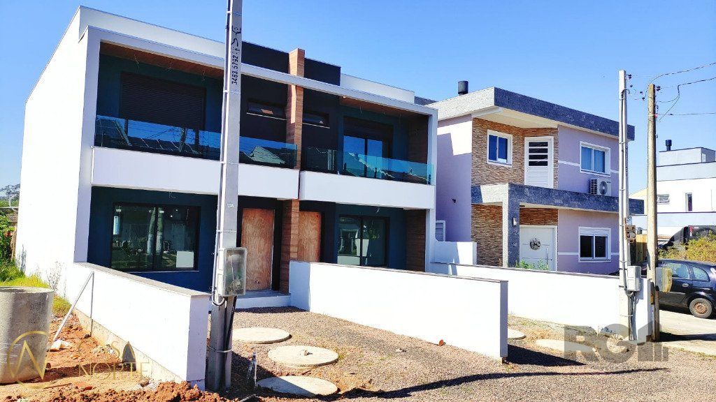 Sobrado à venda com 3 quartos, 123m², 1 suíte, 2 vagas, Rua Ana Abruzzi no bairro Mário Quintana em Porto Alegre