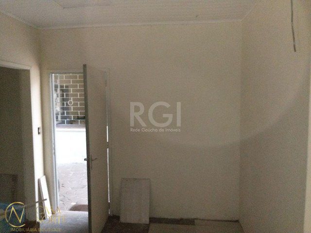 Casa à venda com 2 quartos, 300m², 1 suíte, 3 vagas, Travessa Americo Silveira no bairro Cristo Redentor em Porto Alegre
