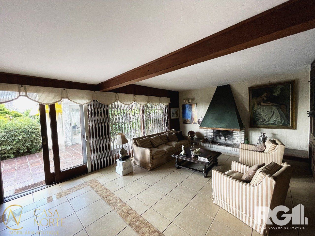 Casa à venda com 4 quartos, 364m², 3 suítes, 4 vagas, Rua Coroados no bairro Vila Assunção em Porto Alegre