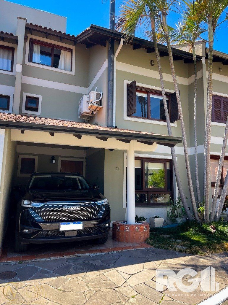 Casa de Condomínio à venda com 4 quartos, 323m², 3 suítes, 2 vagas, Rua Doutor Pereira Neto no bairro Tristeza em Porto Alegre