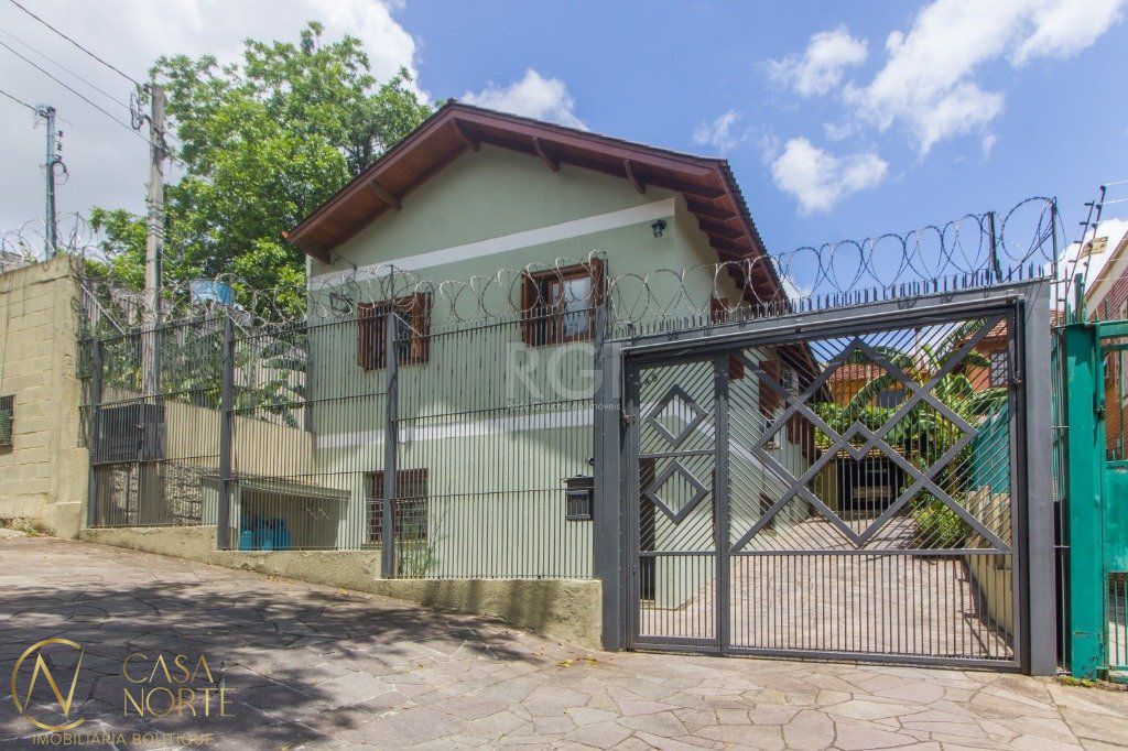 Casa à venda com 5 quartos, 510m², 1 suíte, 10 vagas, Rua Intendente Alfredo Azevedo no bairro Glória em Porto Alegre