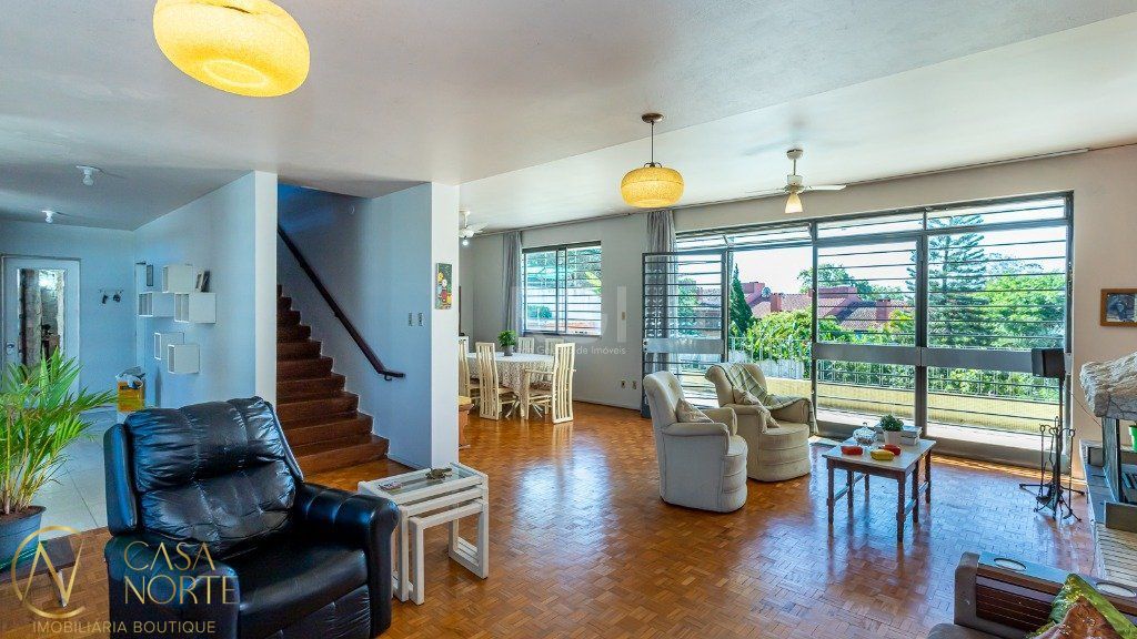 Casa à venda com 5 quartos, 500m², 1 suíte, 5 vagas, Rua Correa Lima no bairro Santa Tereza em Porto Alegre
