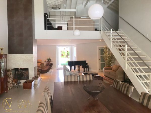 Casa de Condomínio à venda com 4 quartos, 414m², 4 suítes, 4 vagas, Avenida Juca Batista no bairro Belém Novo em Porto Alegre
