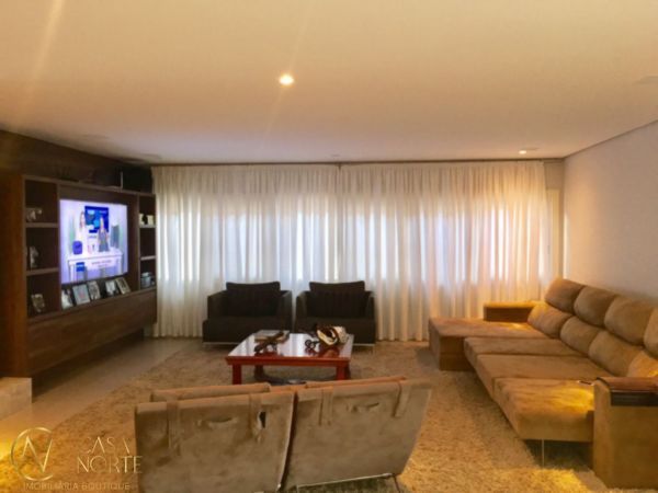 Casa de Condomínio à venda com 4 quartos, 414m², 4 suítes, 4 vagas, Avenida Juca Batista no bairro Belém Novo em Porto Alegre