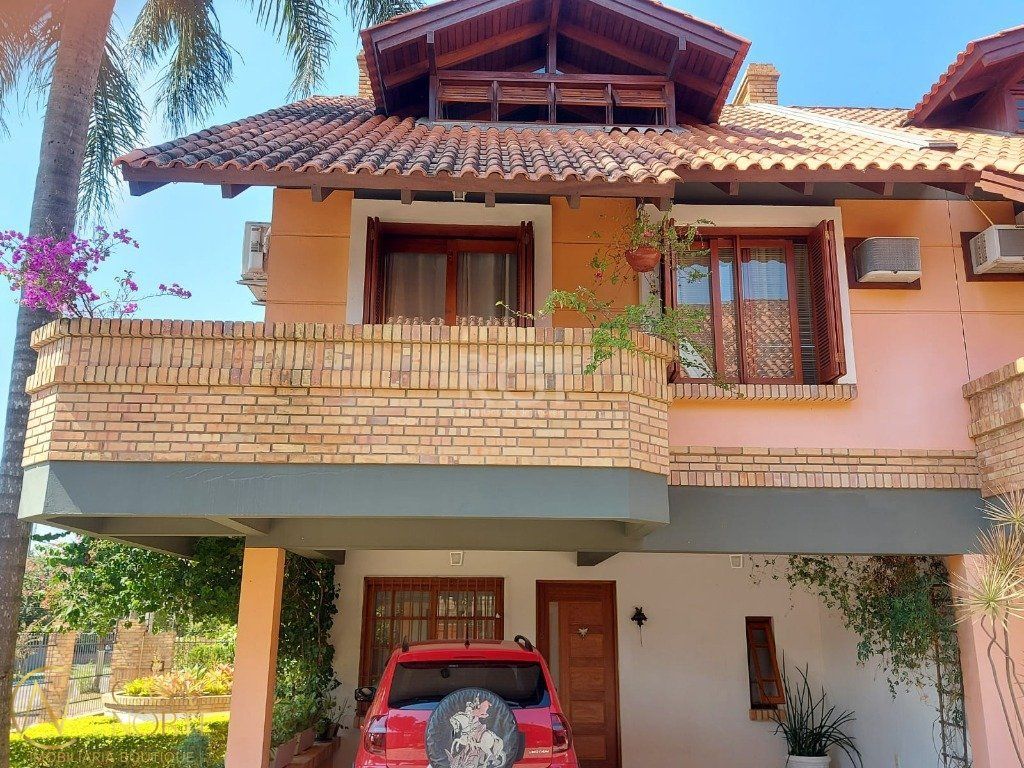 Casa de Condomínio à venda com 3 quartos, 234m², 1 suíte, 2 vagas, Rua Sargento Nicolau Dias de Farias no bairro Tristeza em Porto Alegre