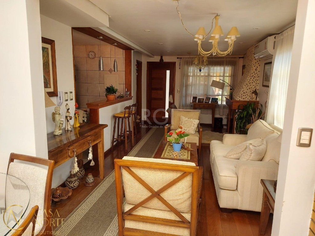 Casa de Condomínio à venda com 3 quartos, 234m², 1 suíte, 2 vagas, Rua Sargento Nicolau Dias de Farias no bairro Tristeza em Porto Alegre