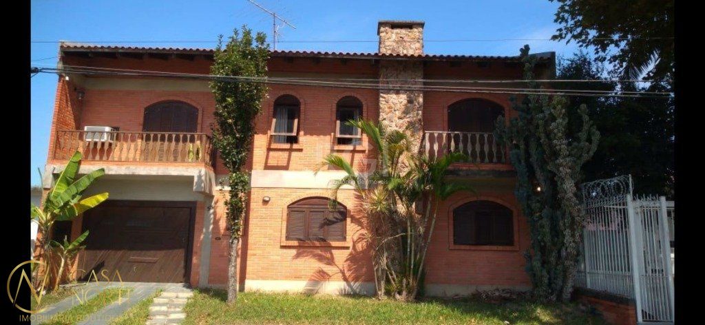 Casa à venda com 3 quartos, 326m², 2 suítes, 4 vagas, Rua Esther Esqueff da Silva no bairro Rubem Berta em Porto Alegre