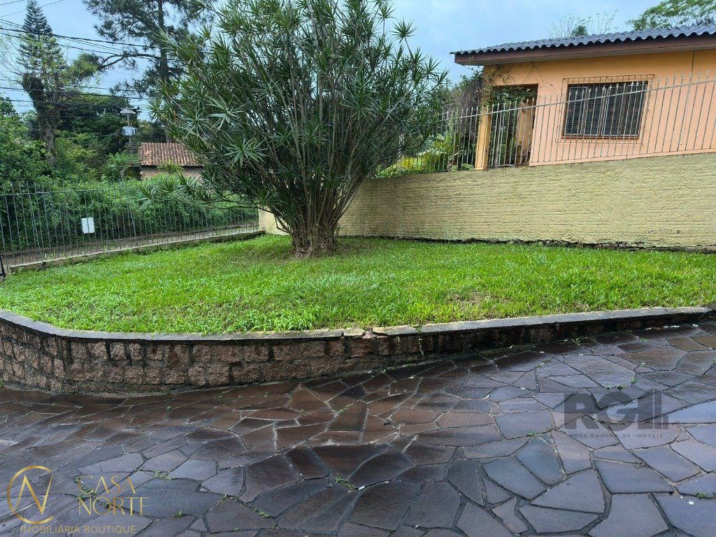 Casa à venda com 3 quartos, 129m², 1 suíte, 2 vagas, Rua Natércia Cunha Veloso no bairro Morro Santana em Porto Alegre
