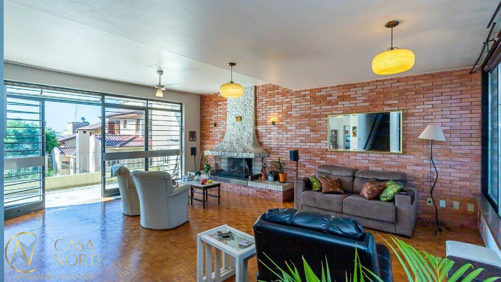 Casa à venda com 5 quartos, 500m², 1 suíte, 5 vagas, Rua Correa Lima no bairro Santa Tereza em Porto Alegre