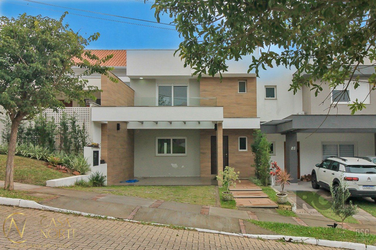 Casa de Condomínio à venda com 3 quartos, 200m², 1 suíte, 2 vagas, Rua Adriano Pereira da Silva no bairro Vila Nova em Porto Alegre