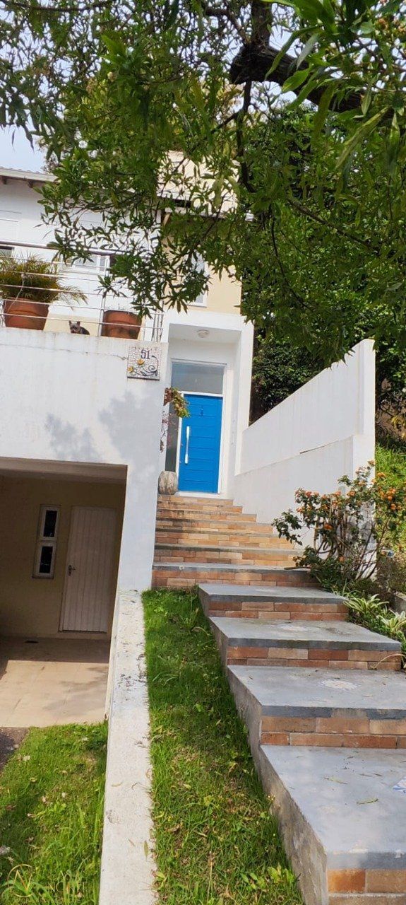Casa de Condomínio à venda com 2 quartos, 185m², 2 suítes, 4 vagas, Rua Adriano Pereira da Silva no bairro Vila Nova em Porto Alegre