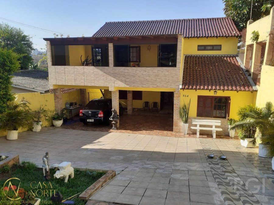 Casa à venda com 3 quartos, 300m², 1 suíte, 5 vagas, Rua Coronel José Rodrigues Sobral no bairro Partenon em Porto Alegre