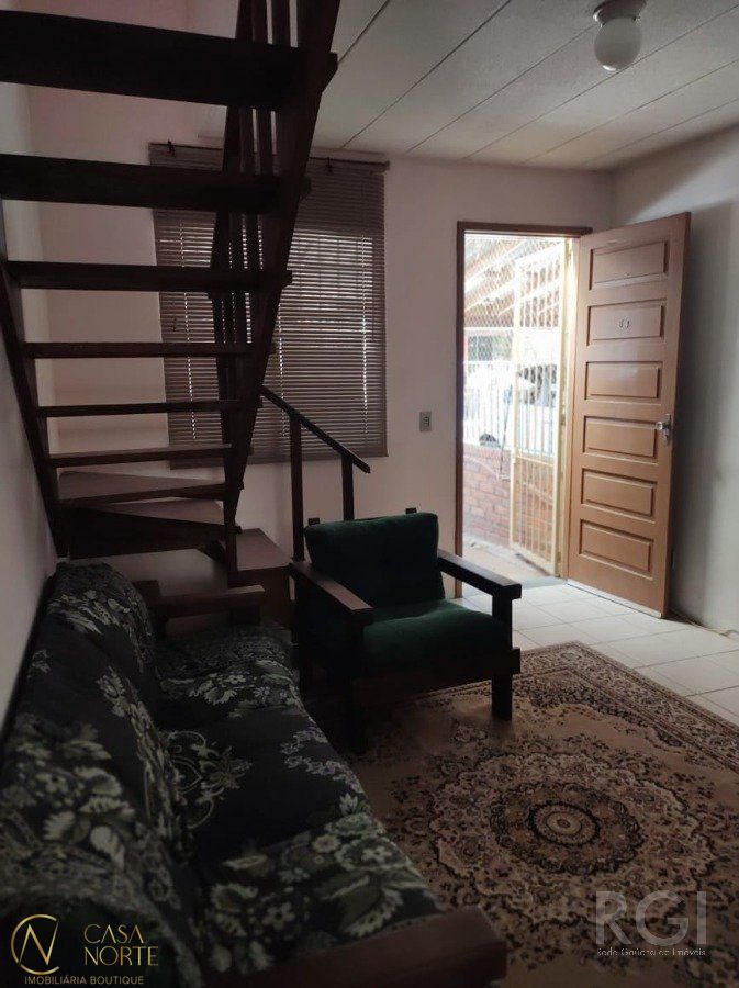 Casa à venda com 2 quartos, 55m², 1 vaga, Rua Atilio Supertti no bairro Vila Nova em Porto Alegre
