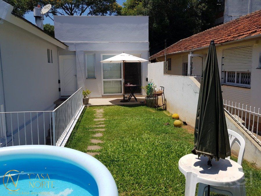 Casa à venda com 4 quartos, 200m², 1 suíte, 4 vagas, Acesso das Araucarias no bairro Santa Tereza em Porto Alegre