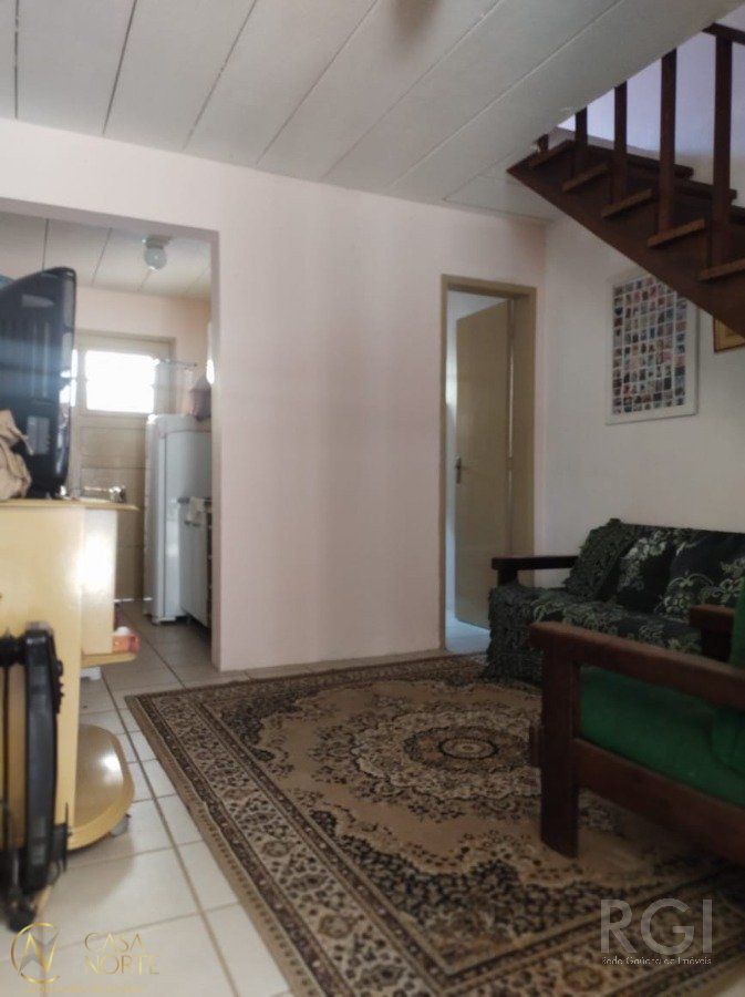 Casa à venda com 2 quartos, 55m², 1 vaga, Rua Atilio Supertti no bairro Vila Nova em Porto Alegre