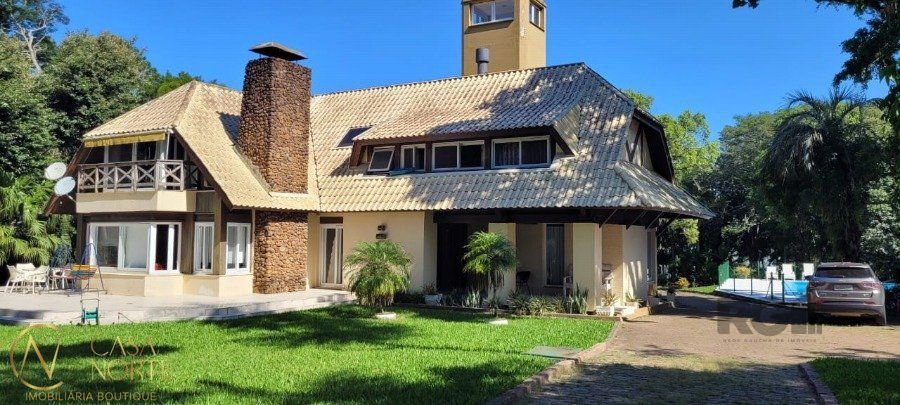 Casa à venda com 4 quartos, 500m², 4 suítes, 20 vagas, Estrada Retiro da Ponta Grossa no bairro Ponta Grossa em Porto Alegre
