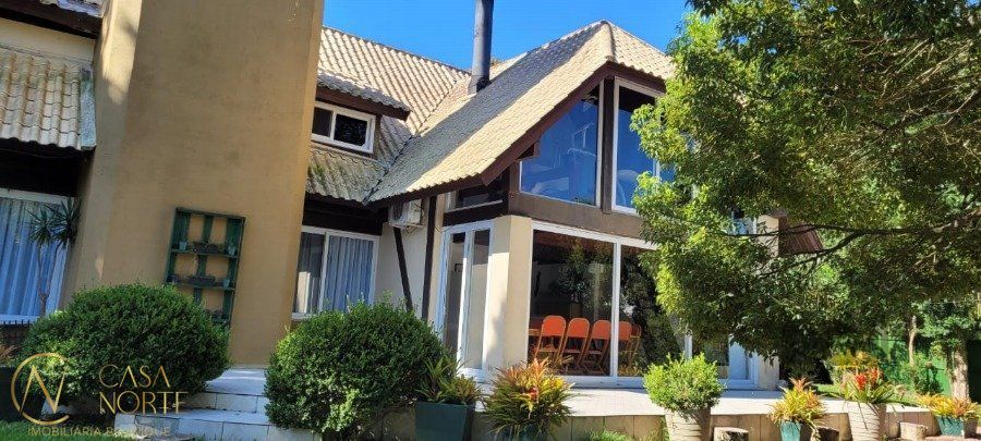 Casa à venda com 4 quartos, 500m², 4 suítes, 20 vagas, Estrada Retiro da Ponta Grossa no bairro Ponta Grossa em Porto Alegre