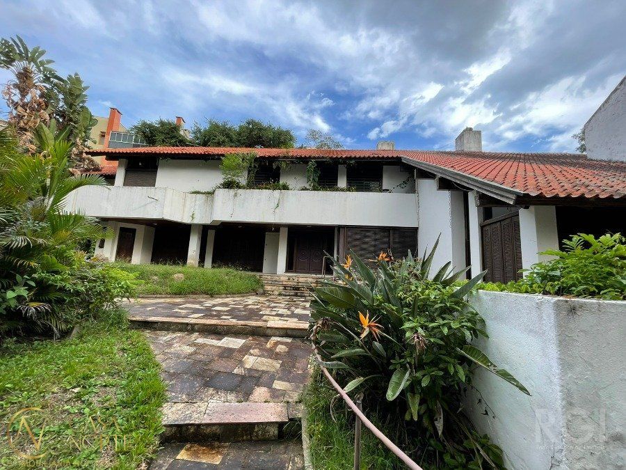 Casa à venda com 5 quartos, 500m², 3 suítes, Avenida Guaiba no bairro Vila Assunção em Porto Alegre