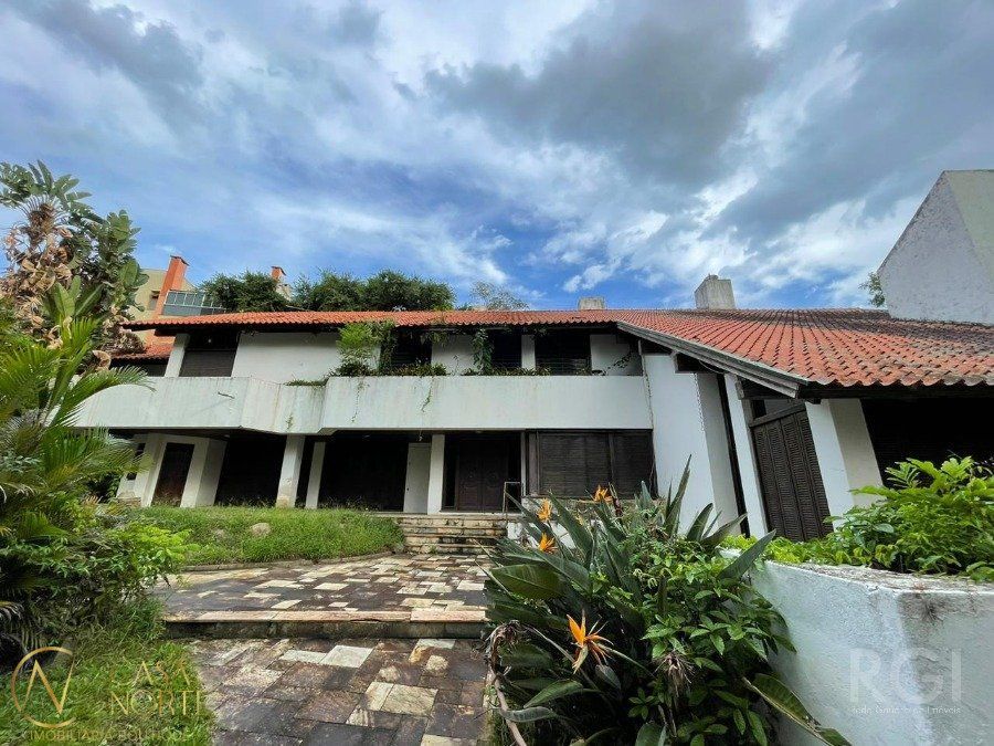 Casa à venda com 5 quartos, 500m², 3 suítes, Avenida Guaiba no bairro Vila Assunção em Porto Alegre