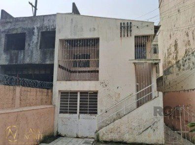 Casa à venda com 3 quartos, 95m², 2 vagas, Rua Israel no bairro Vila Jardim em Porto Alegre