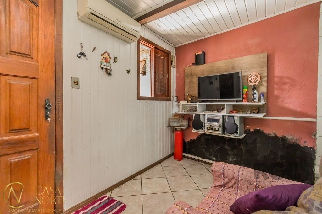 Casa à venda com 4 quartos, 224m², 2 vagas, Avenida Ipê no bairro Vila Jardim em Porto Alegre