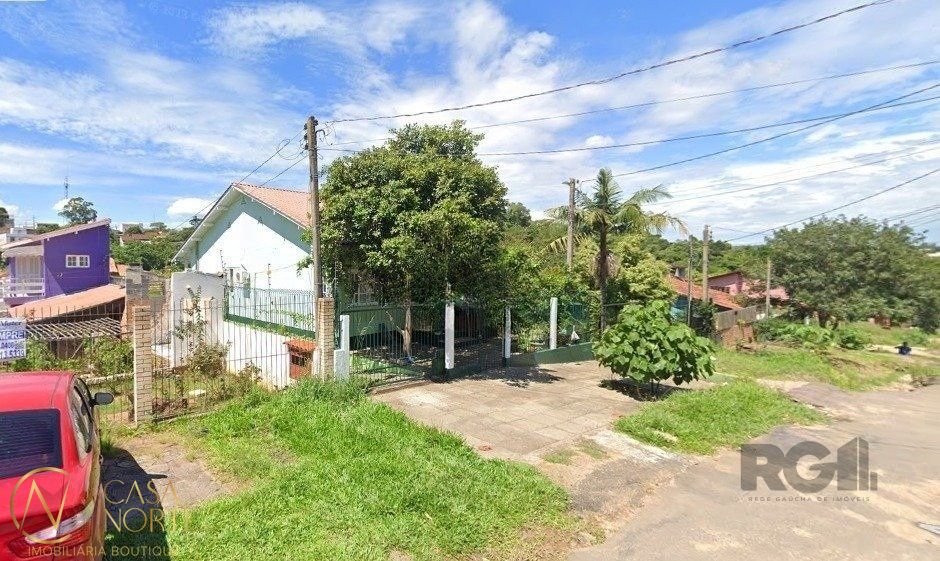 Casa à venda com 3 quartos, 152m², 3 vagas, Rua Ênio de Souza no bairro Vila Nova em Porto Alegre