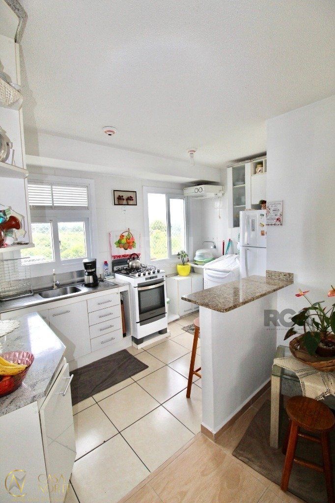 Apartamento à venda com 2 quartos, 47m², 1 vaga, Rua Napoleao Jacques da Rosa no bairro Restinga em Porto Alegre