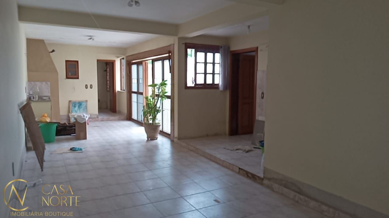 Casa à venda com 3 quartos, 191m², 1 suíte, 3 vagas, Avenida Cruz Alta no bairro Nonoai em Porto Alegre