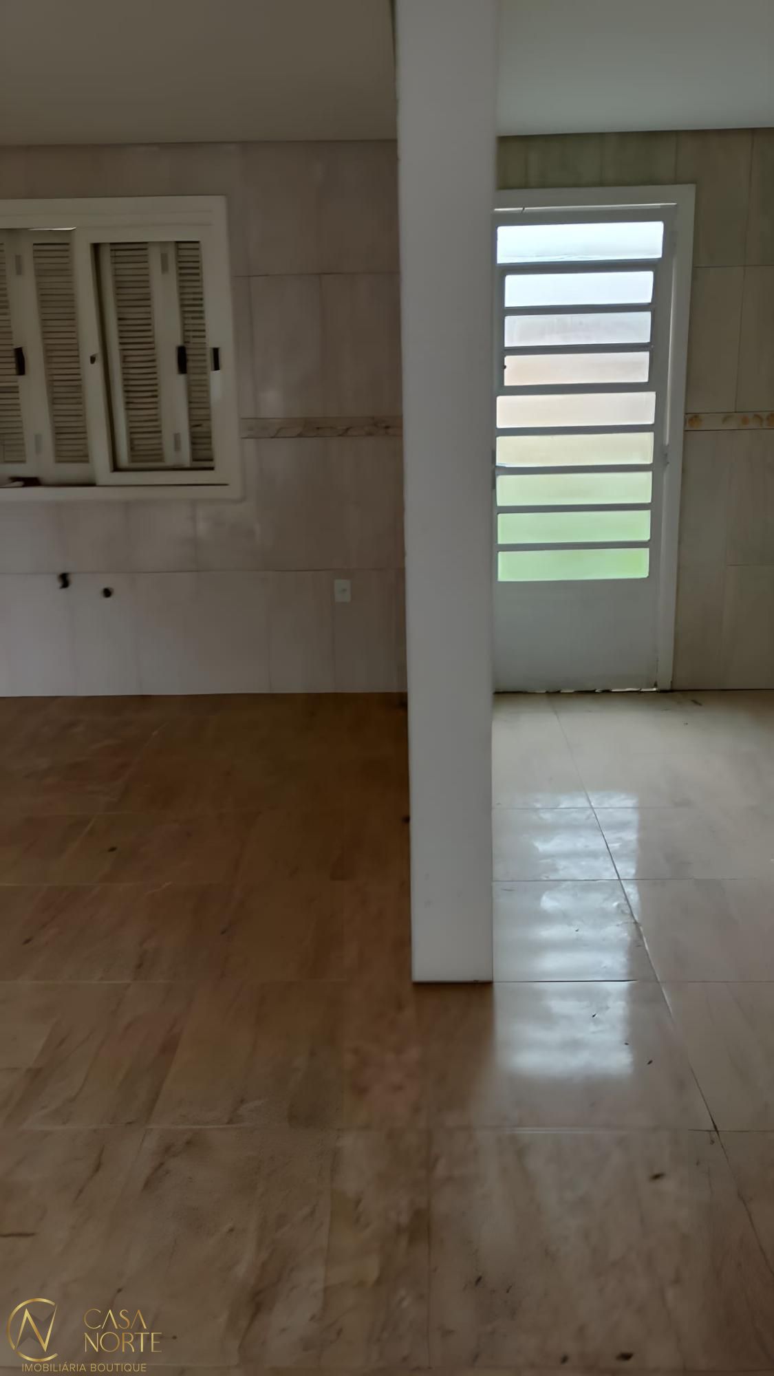 Casa à venda com 2 quartos, 91m², 2 vagas, Rua Ilton Moreira de Souza no bairro Ponta Grossa em Porto Alegre