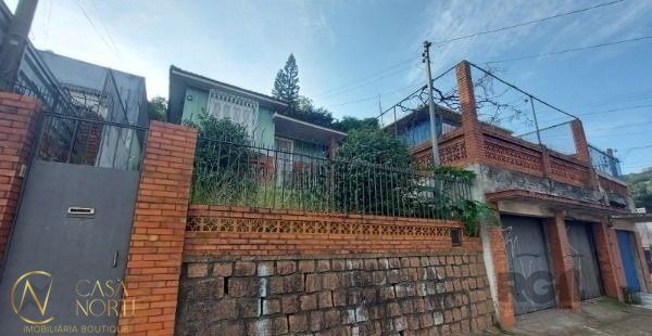 Casa à venda com 3 quartos, 180m², 2 vagas, Avenida Professor Oscar Pereira no bairro Glória em Porto Alegre