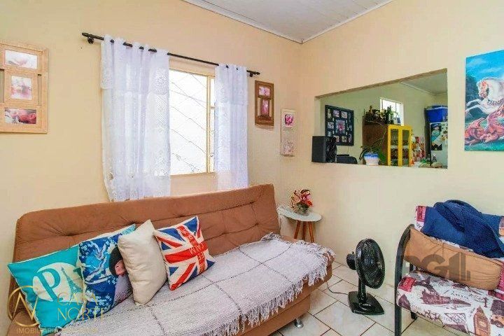 Casa à venda com 2 quartos, 70m², 3 vagas, Rua Banco Inglês no bairro Santa Tereza em Porto Alegre